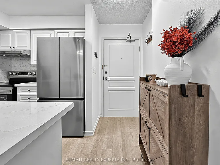 300 Ray Lawson Blvd #512 — Photo 11