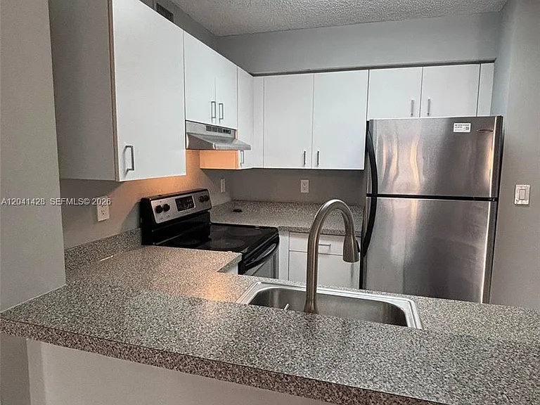 761 N Pine Island Rd #203 — Photo 11