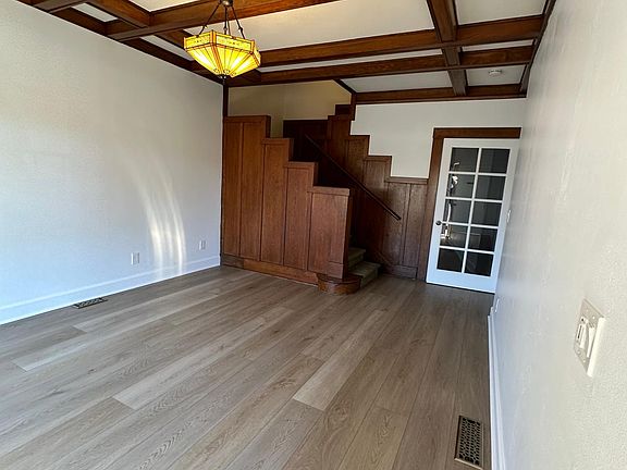 Foyer/Parlor, Staircase, French Door Headed to Kitchen and Hall