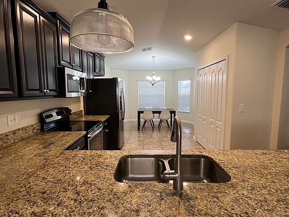 3rd image of 16707 Magnolia Reserve Pl #1