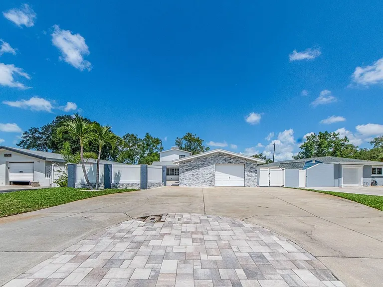 HUGE Driveway easily accommodates 6+ vehicles or an RV