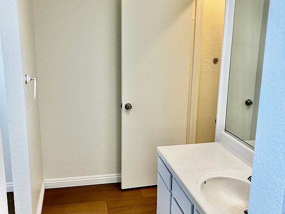 Master Bath Dressing Area - Walk-In Closet to the Left and Separate Shower/Commode to the Right