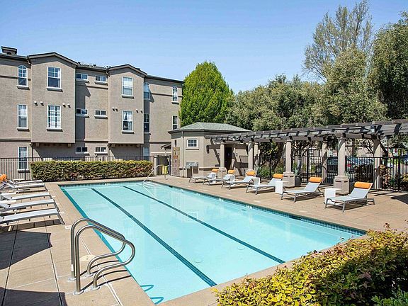 Resort style pool and sun deck at Renaissance Apartment Homes in Santa Rosa