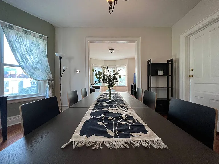 Large dining area that easily fits 6, can accommodate 8 if needed.