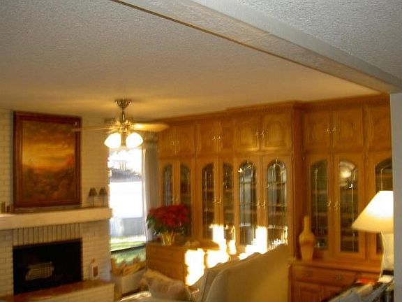 Living Room w/fireplace & Cabinetry