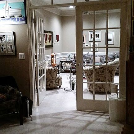 Living room opens to library