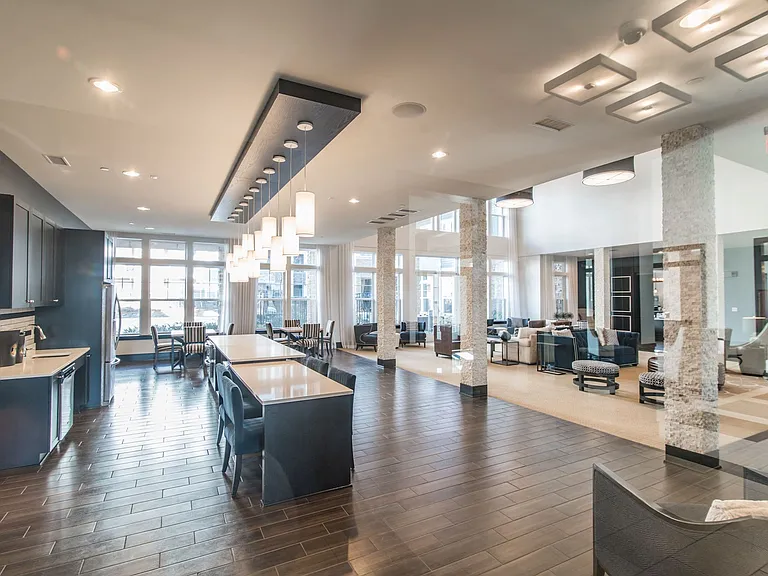 Modern Resident Lounge with Bar and Communal Tables