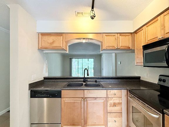 2nd image of 10155 Sailwinds Blvd S APT 204