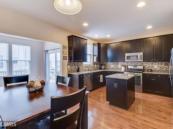 Open Concept Kitchen with Sunroom Bumpout