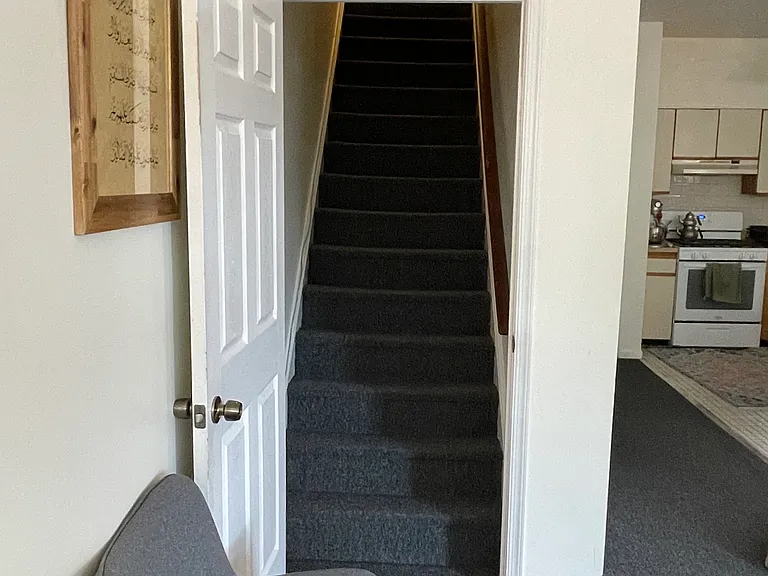 Stairs from living room to upstairs