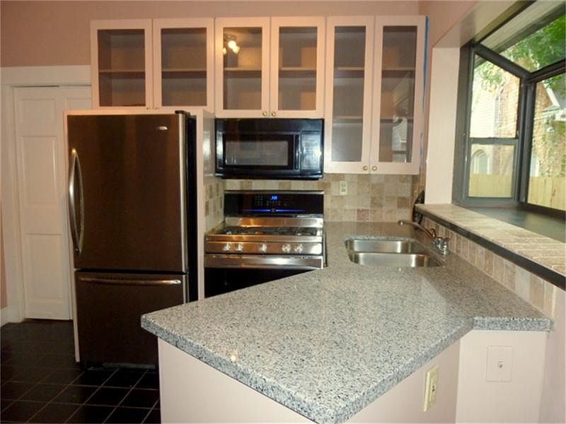 Angled kitchen counter adds interest.
