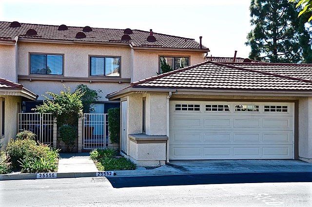 Two car garage leading into the front courtyard.