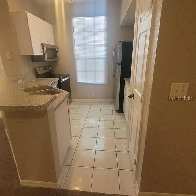 6328 Raleigh St — Photo 4