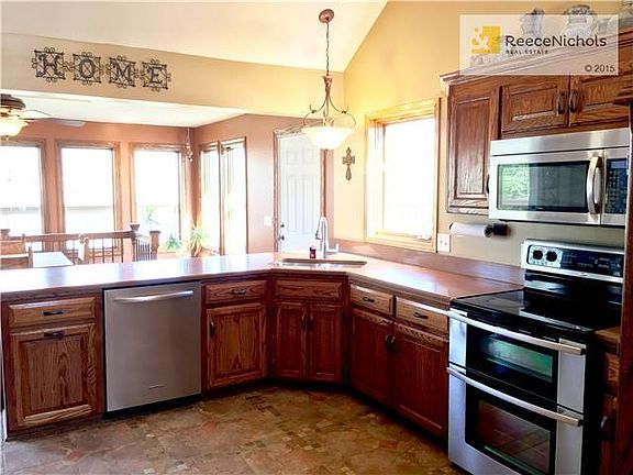 Kitchen w/ Newer Countertops, Stainless Steel Appliances including Double Oven.