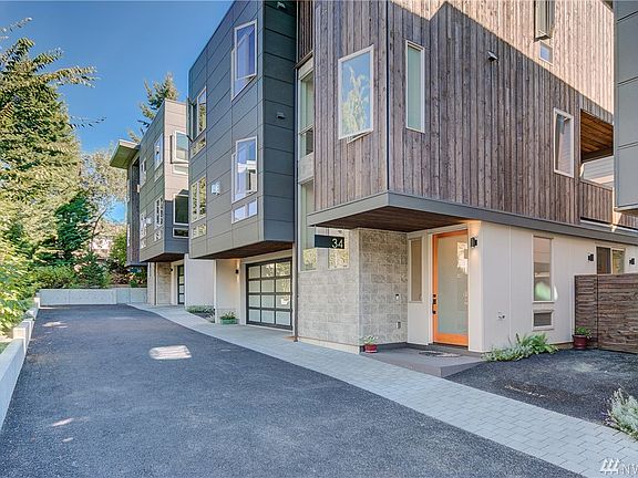Unit 34 with 2 car garage and 1 dedicated guest spot