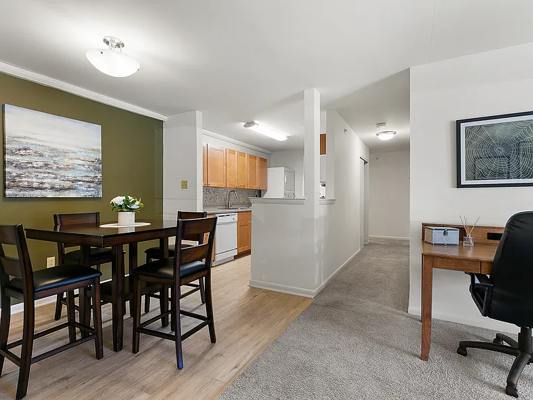 Open-Concept Dining Area with Luxury Vinyl Plank Flooring
