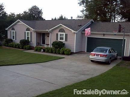 Front Of House With Two Car Garage