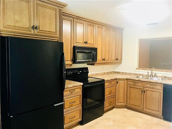 Kitchen with Solid wood cabinets