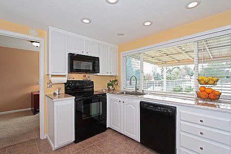 Recessed lighting and plenty of natural light.