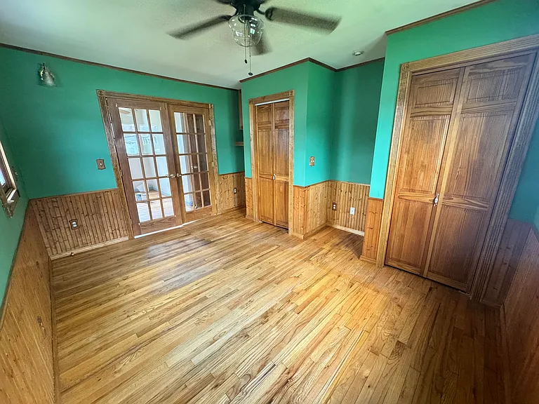 Master bedroom with two closets