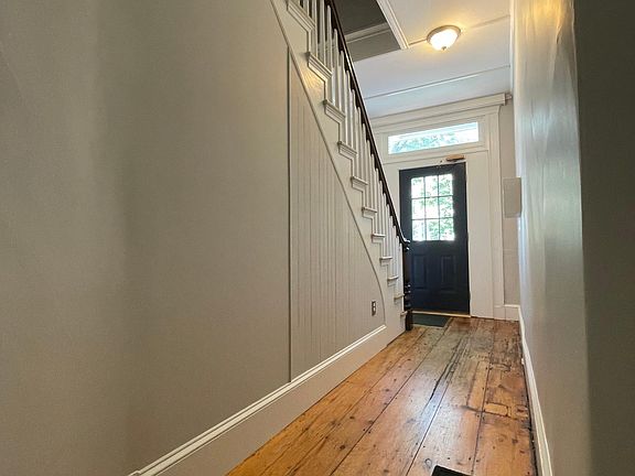 18 North front hall (with secure entry, interior mailboxes, and motion sensor lighting).