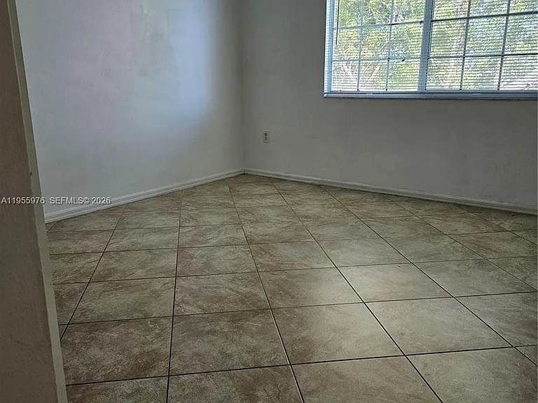 5011 Wiles Rd #306 — Photo 15