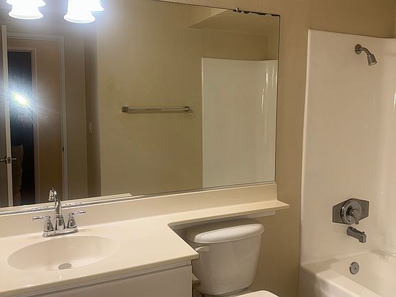 Shared bathroom for two bedrooms.