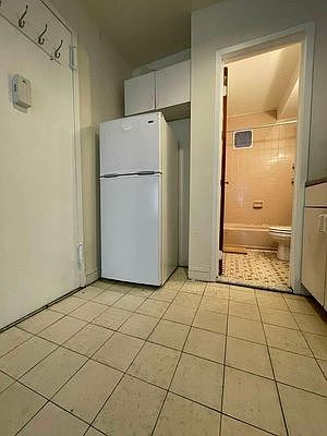 2nd image of 217 E 4th St #3