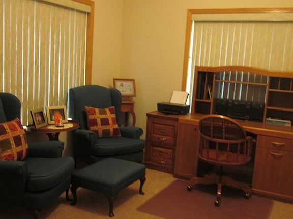 Sunroom with Sliding Glass Door to Patio
