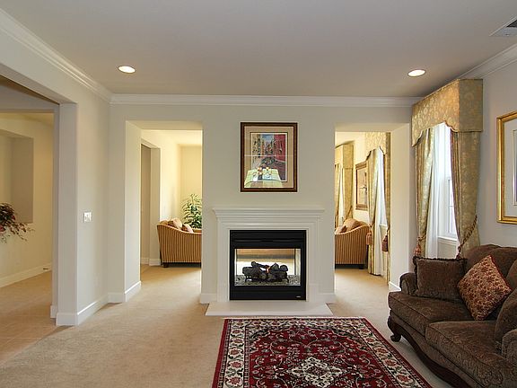 Living Room and Library with Dual-Sided Fireplace