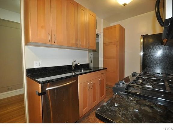 New Eat-in-Kitchen with granite counters, stainless steel appliances including a dishwasher, range, 