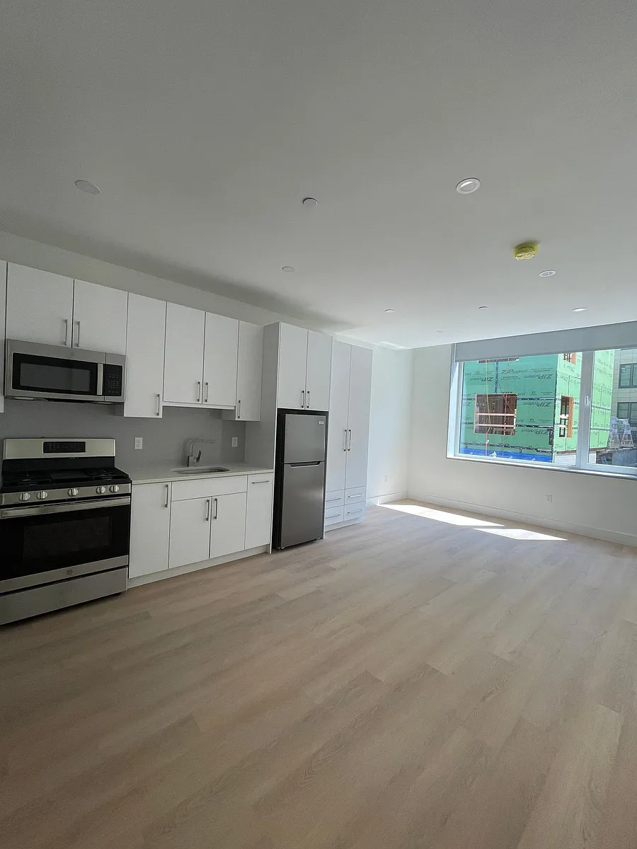Building Photo - 1127 Harrison Ave #210
