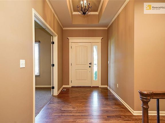 Just off entry, second full bedroom or office space with double doors.