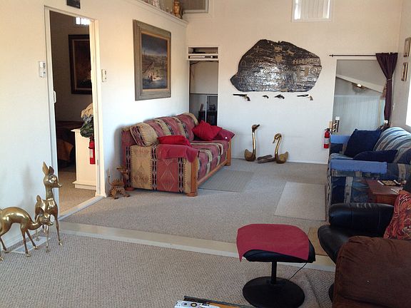 Living rm. and entry to 1 bd