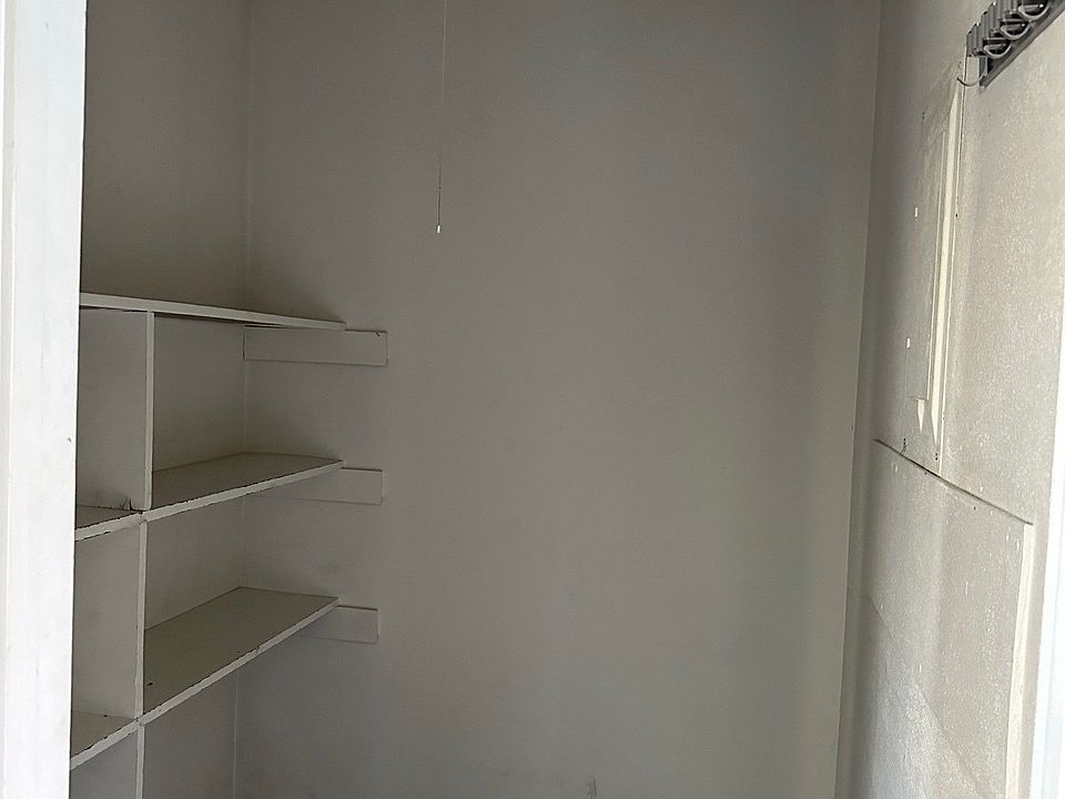 Large storage closet for secure, private storage.
