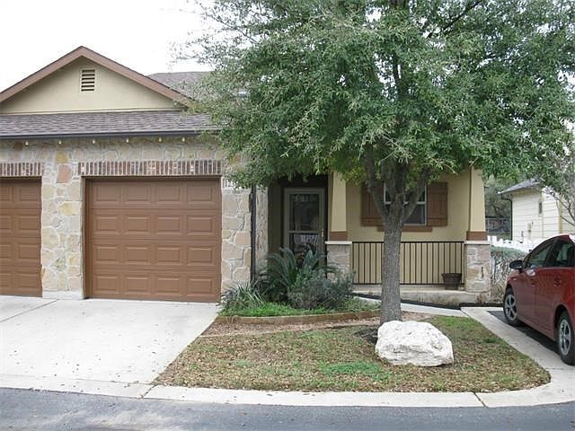 Front view of unit 123R with one garage and one parking slot