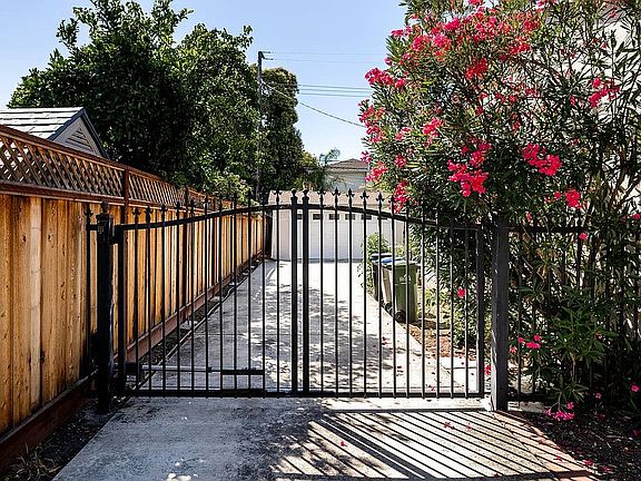 Gate secures back yard.
