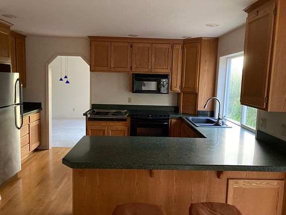 Gourmet kitchen which flows into dining room & living room