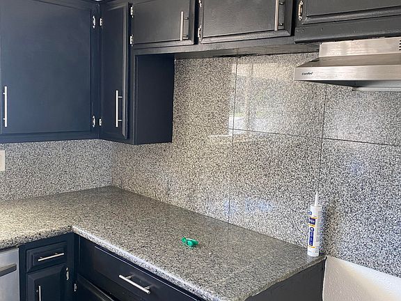 kitchen cabinets granite counter and backsplash