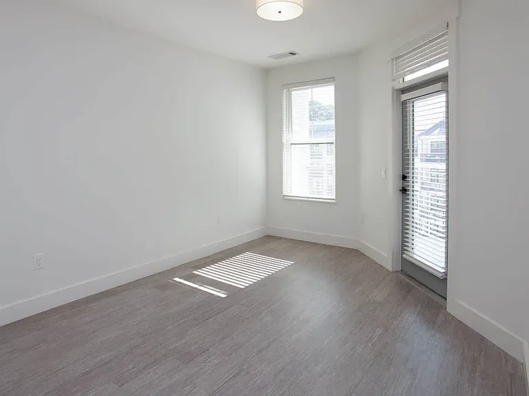 Living Room with Balcony and Hard Surface Flooring