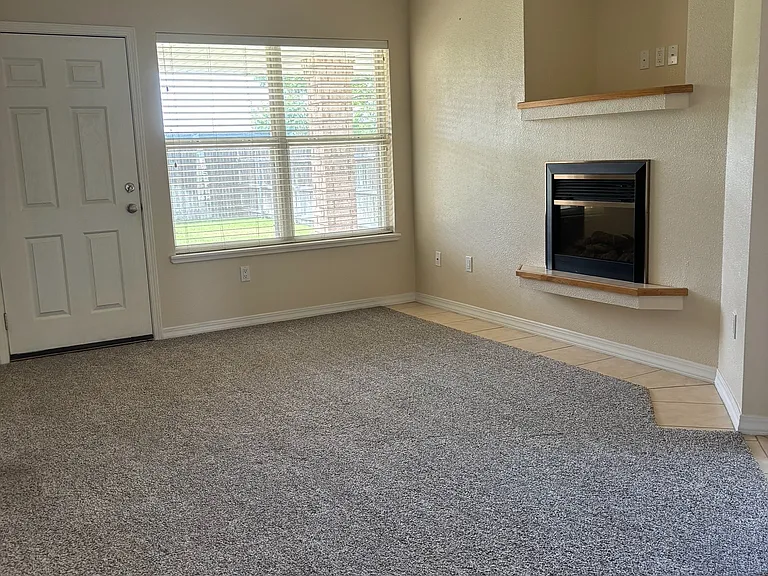 Living room and door to backyard.