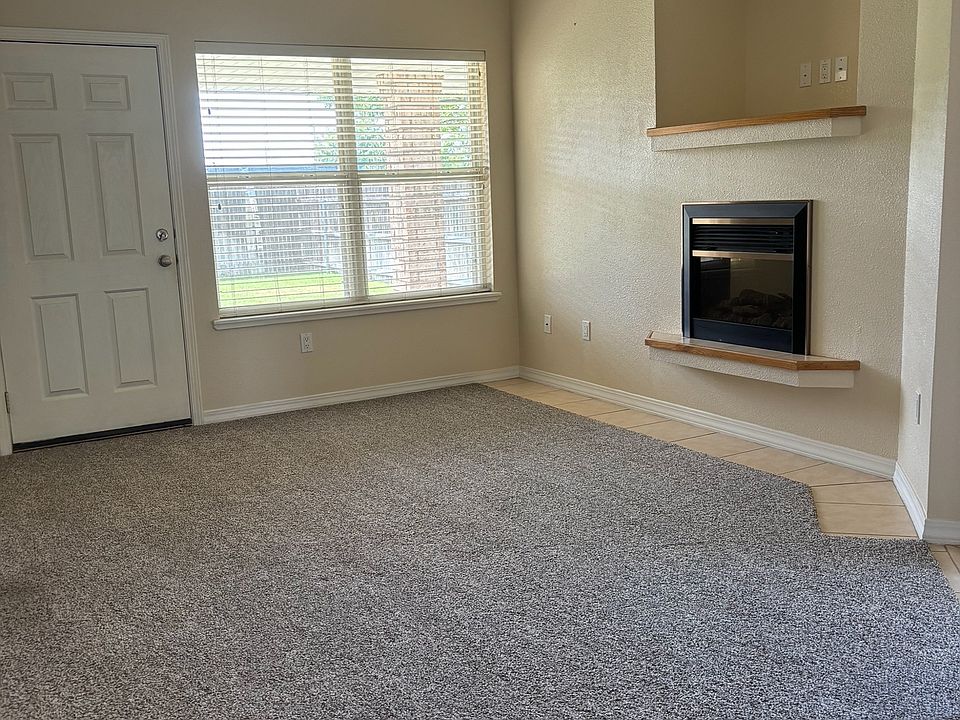 Living room and door to backyard.