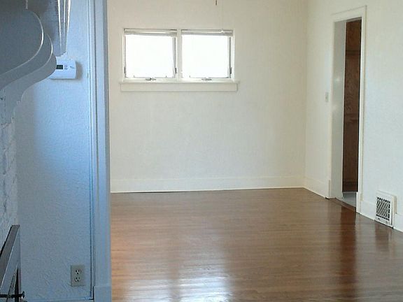 Looking from living area into dining room - every room in the unit has bright light!
