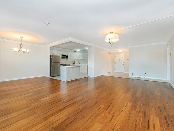 Living room, dining room and kitchen with Island view looking North