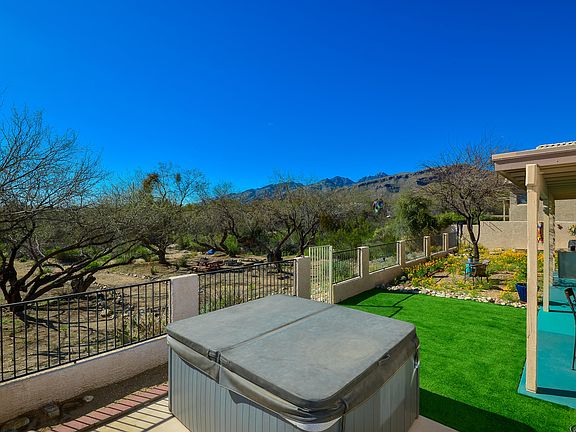 5th image of 9957 E Woodland View Pl