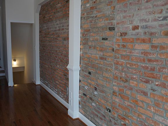 Living Room w/exposed brick