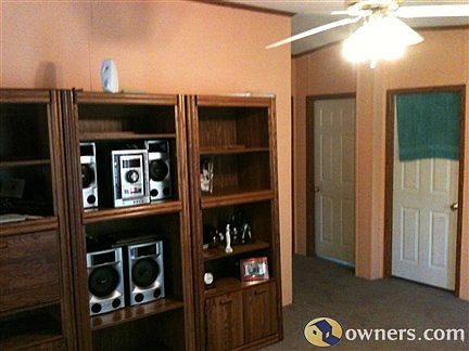 Inside living room facing entrance to the back two bedrooms