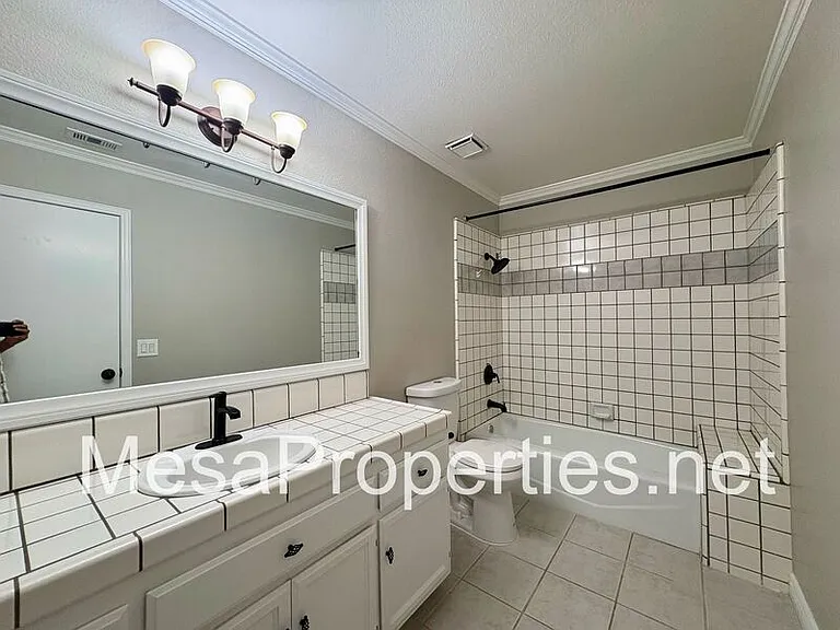 7891 Corona Ave — Photo 15