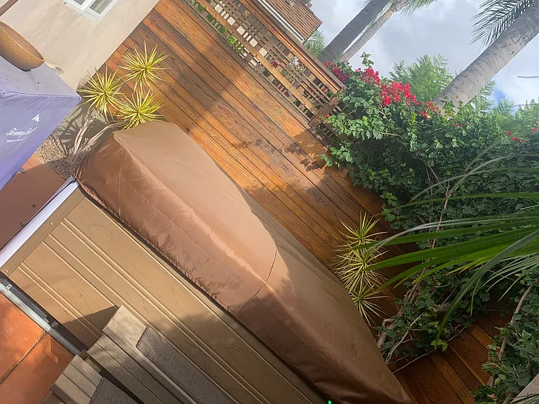 Outside Fenced Private Tropical Patio with Luxurious Hot Tub with Lighting and Bluetooth Speakers