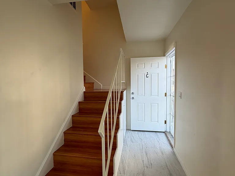 Main entrance with steps to 2nd floor